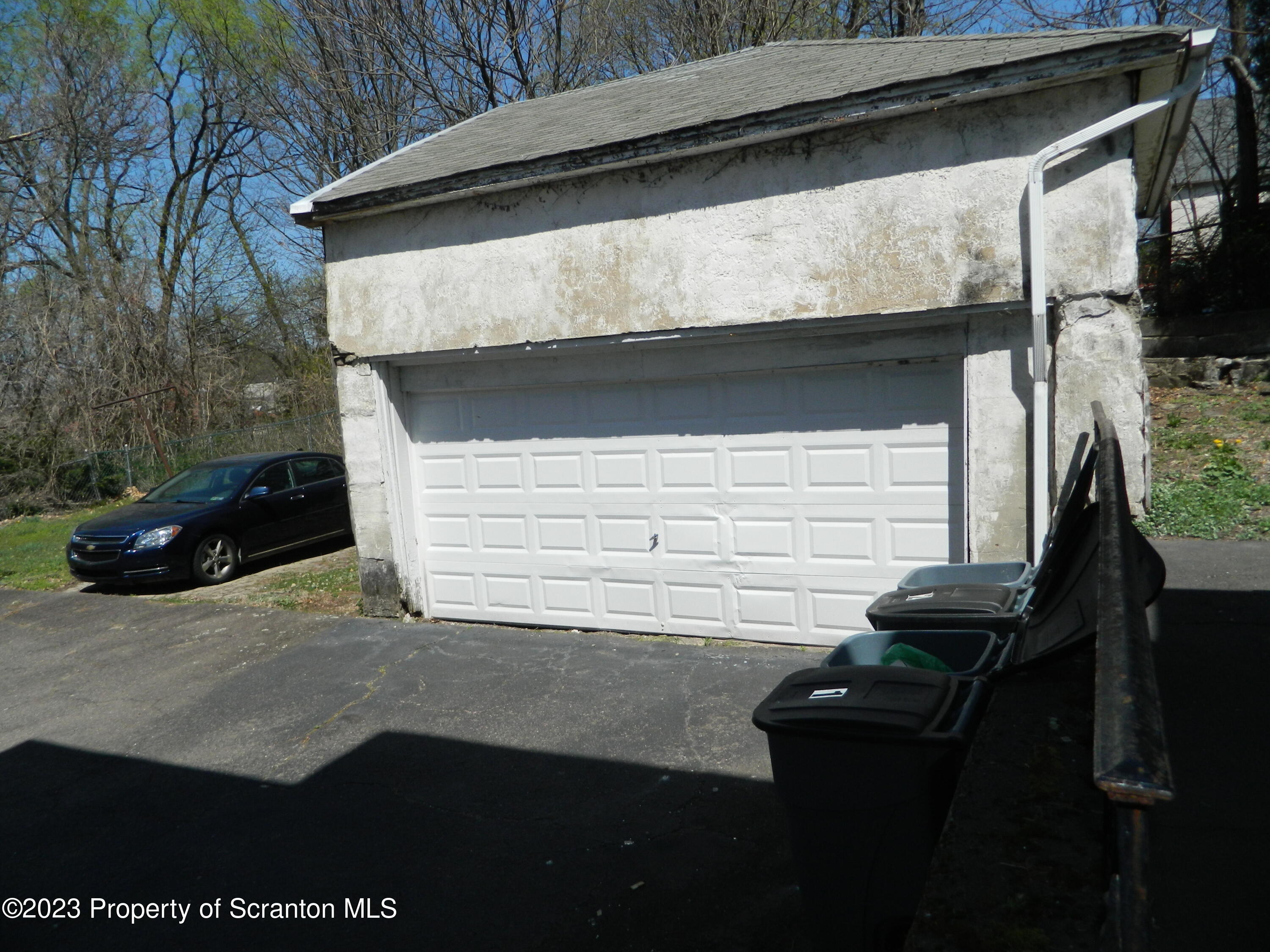 127 East Pine Street Dunmore, PA 18512 - Photo 3 of 20 a view of backyard with cabin