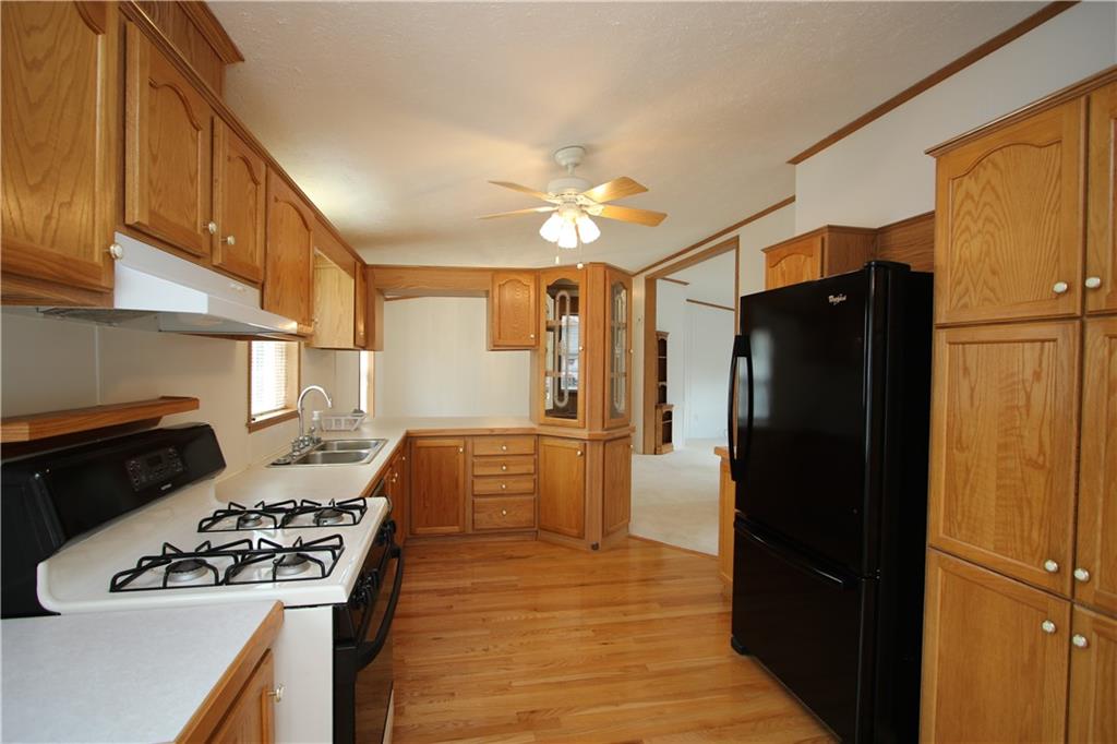 115 Eagle Pointe Estates New Eagle, PA 15067 - Photo 15 of 25 a kitchen with stainless steel appliances granite countertop a refrigerator and a stove