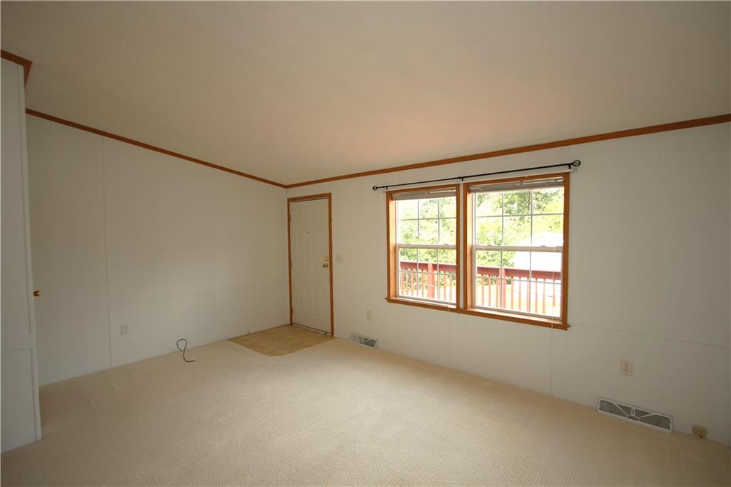115 Eagle Pointe Estates New Eagle, PA 15067 - Photo 16 of 25 an empty room with a empty space and windows