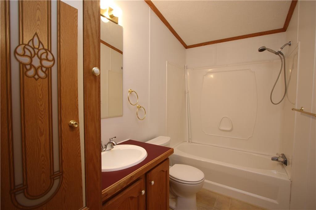 115 Eagle Pointe Estates New Eagle, PA 15067 - Photo 21 of 25 a bathroom with a sink a toilet and shower