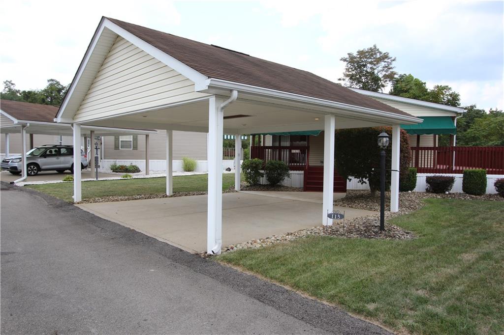 115 Eagle Pointe Estates New Eagle, PA 15067 - Photo 24 of 25 a view of a house with porch and garden