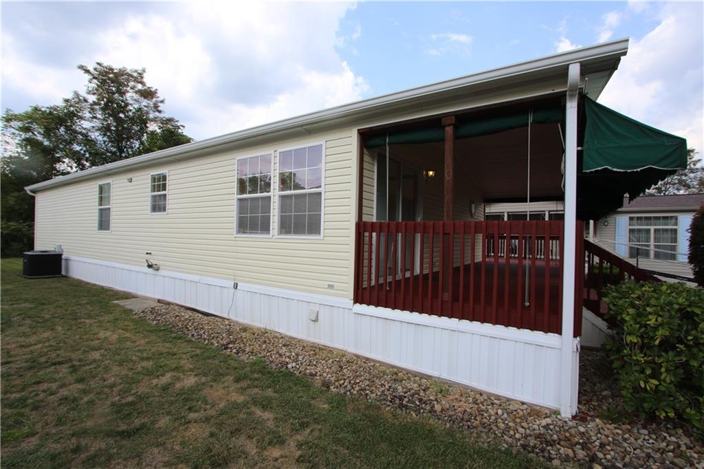 115 Eagle Pointe Estates New Eagle, PA 15067 - Photo 25 of 25 a view of house with small yard and wooden fence
