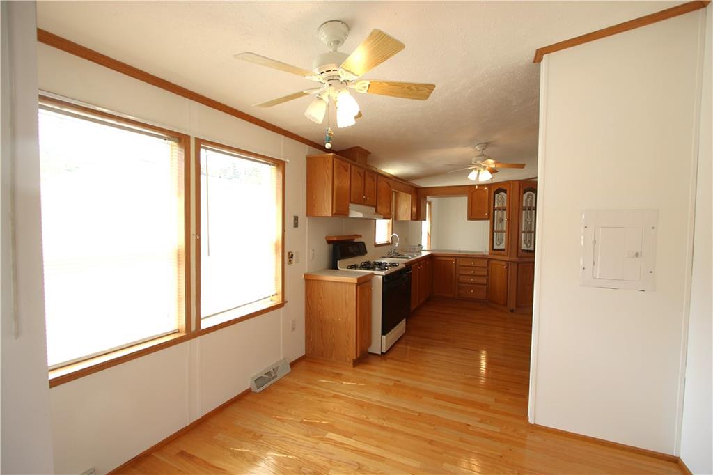 115 Eagle Pointe Estates New Eagle, PA 15067 - Photo 4 of 25 a kitchen with a refrigerator and a sink