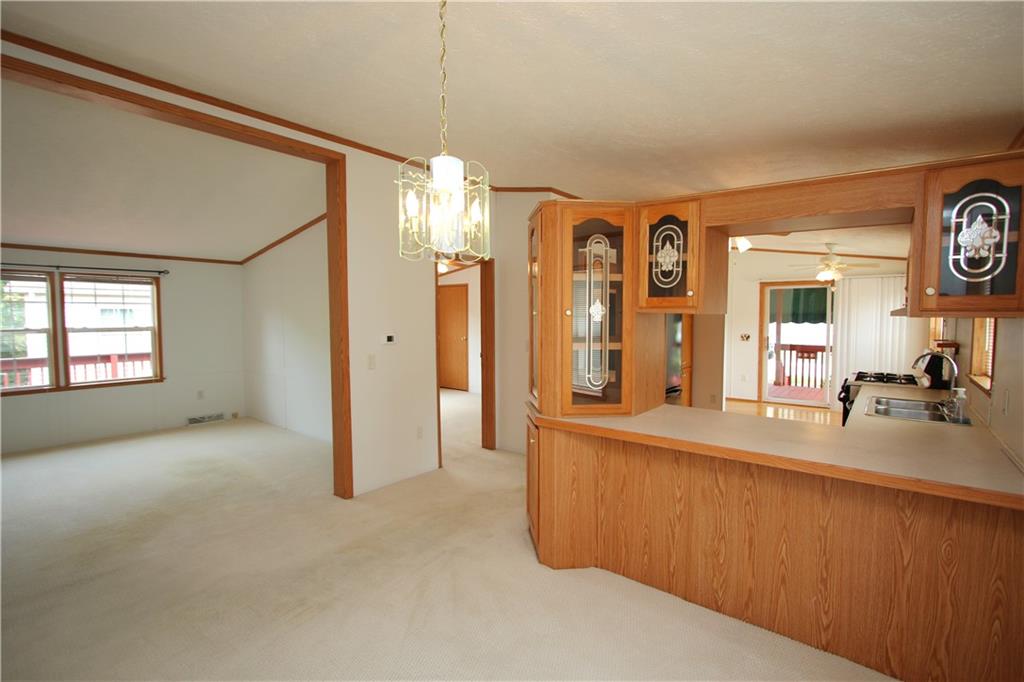 115 Eagle Pointe Estates New Eagle, PA 15067 - Photo 5 of 25 a view of a bathroom with a sink a mirror and a shower