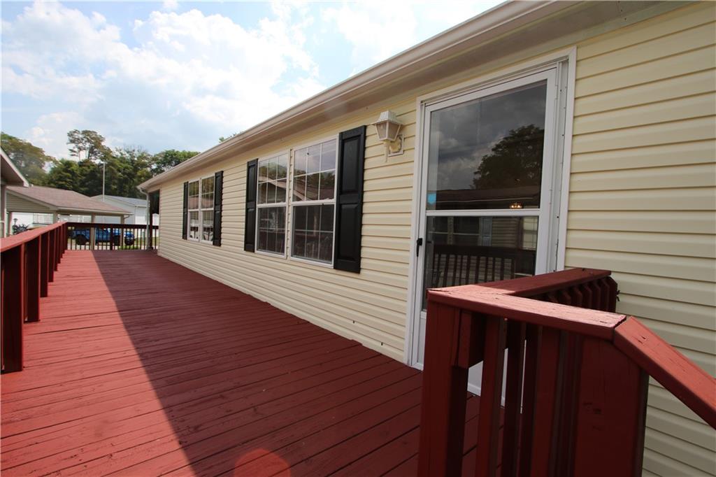 115 Eagle Pointe Estates New Eagle, PA 15067 - Photo 8 of 25 a balcony with wooden floor and furniture