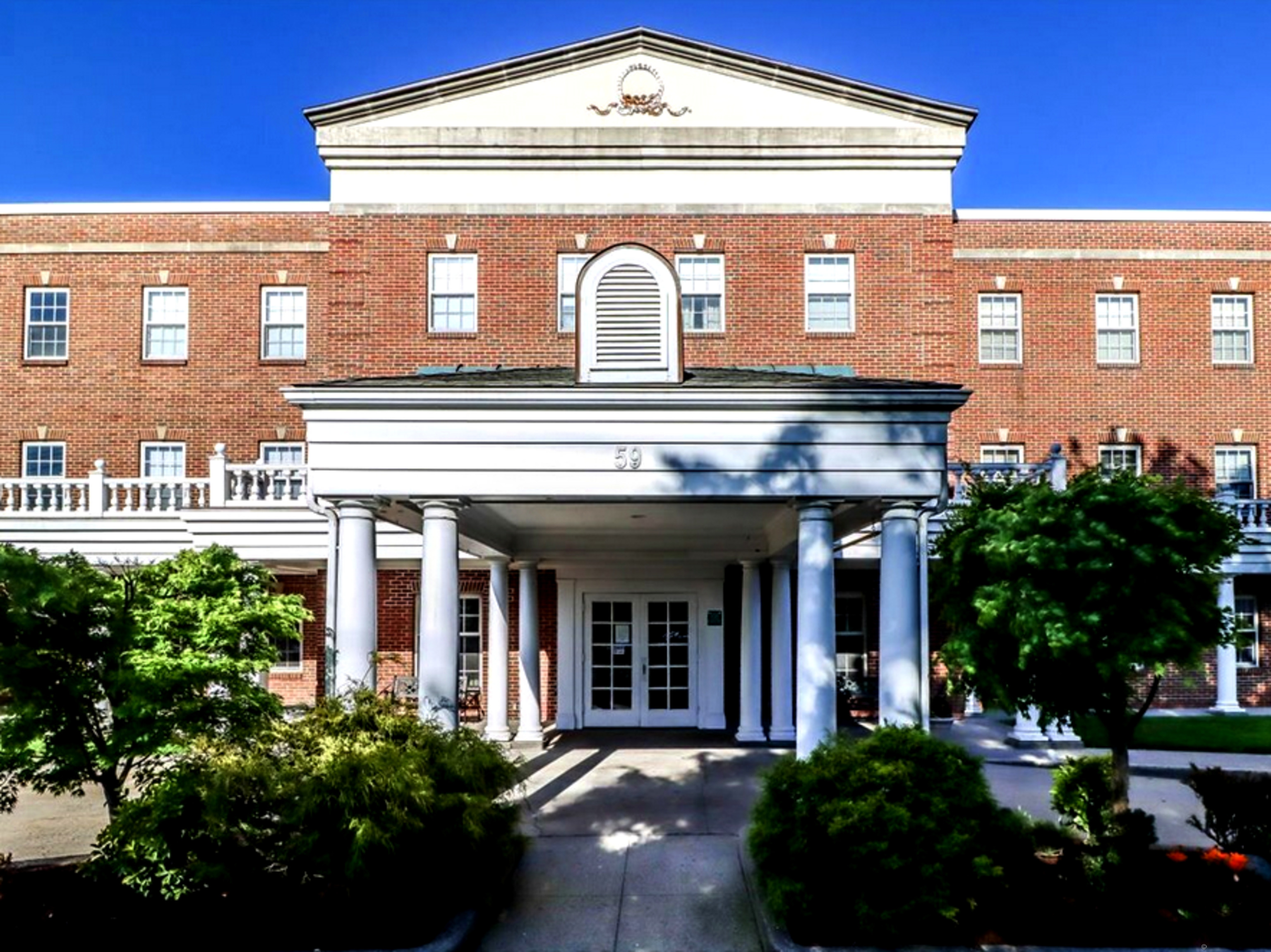 59 Courtland Avenue, Unit 3K Stamford, CT 06902 - Photo 1 of 31 a front view of a house