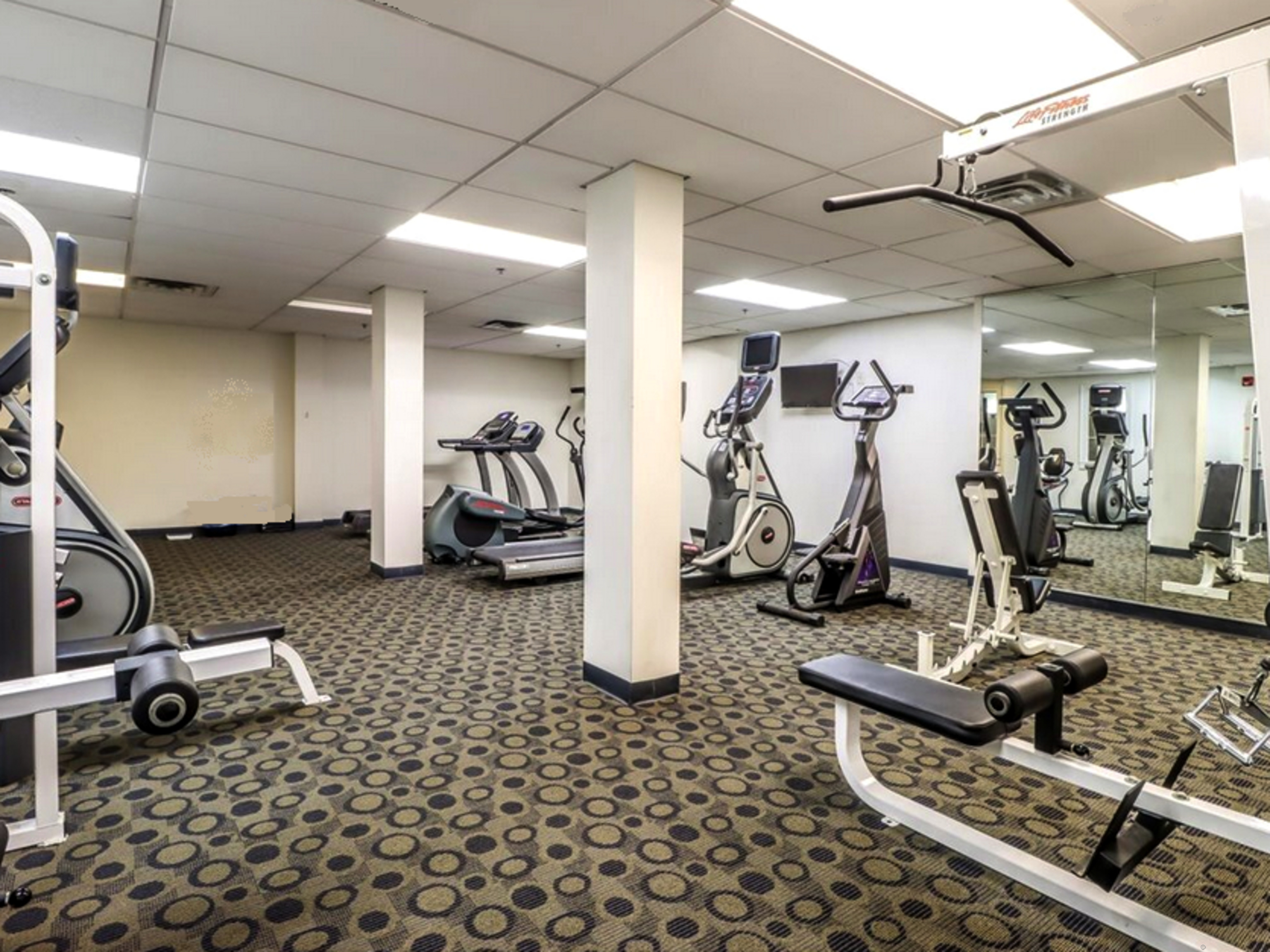 59 Courtland Avenue, Unit 3K Stamford, CT 06902 - Photo 25 of 31 a view of a room with gym equipment