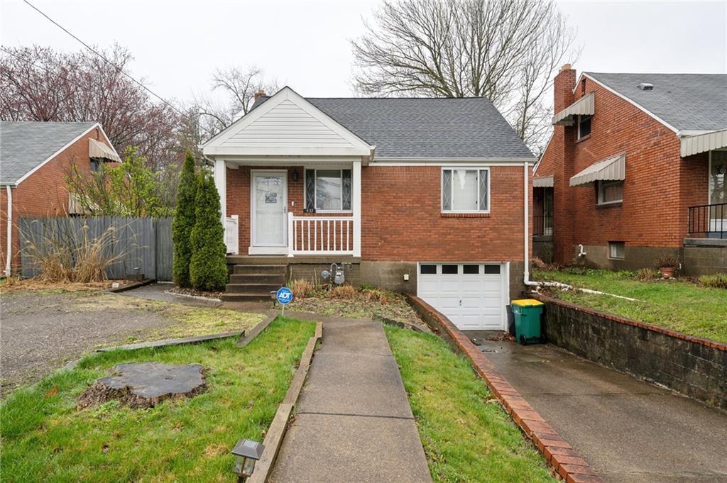431 Thompson Run Road Pittsburgh, PA 15237 - Photo 1 of 27 a front view of a house with a yard