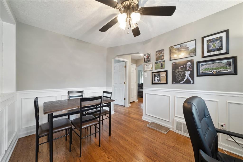 431 Thompson Run Road Pittsburgh, PA 15237 - Photo 12 of 27 a view of a dining room with furniture window and wooden floor