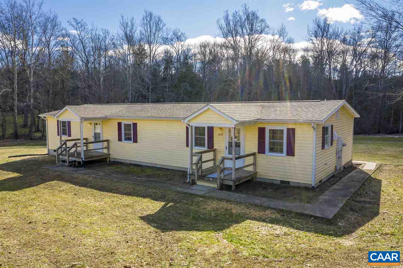 676 Rippin Run Road Ruckersville, VA 22968 - Photo 8 of 27 a view of a house with a yard and sitting area