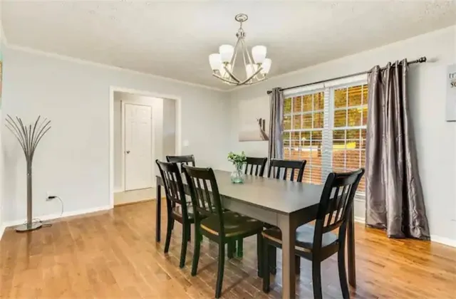 a kitchen with a refrigerator and window