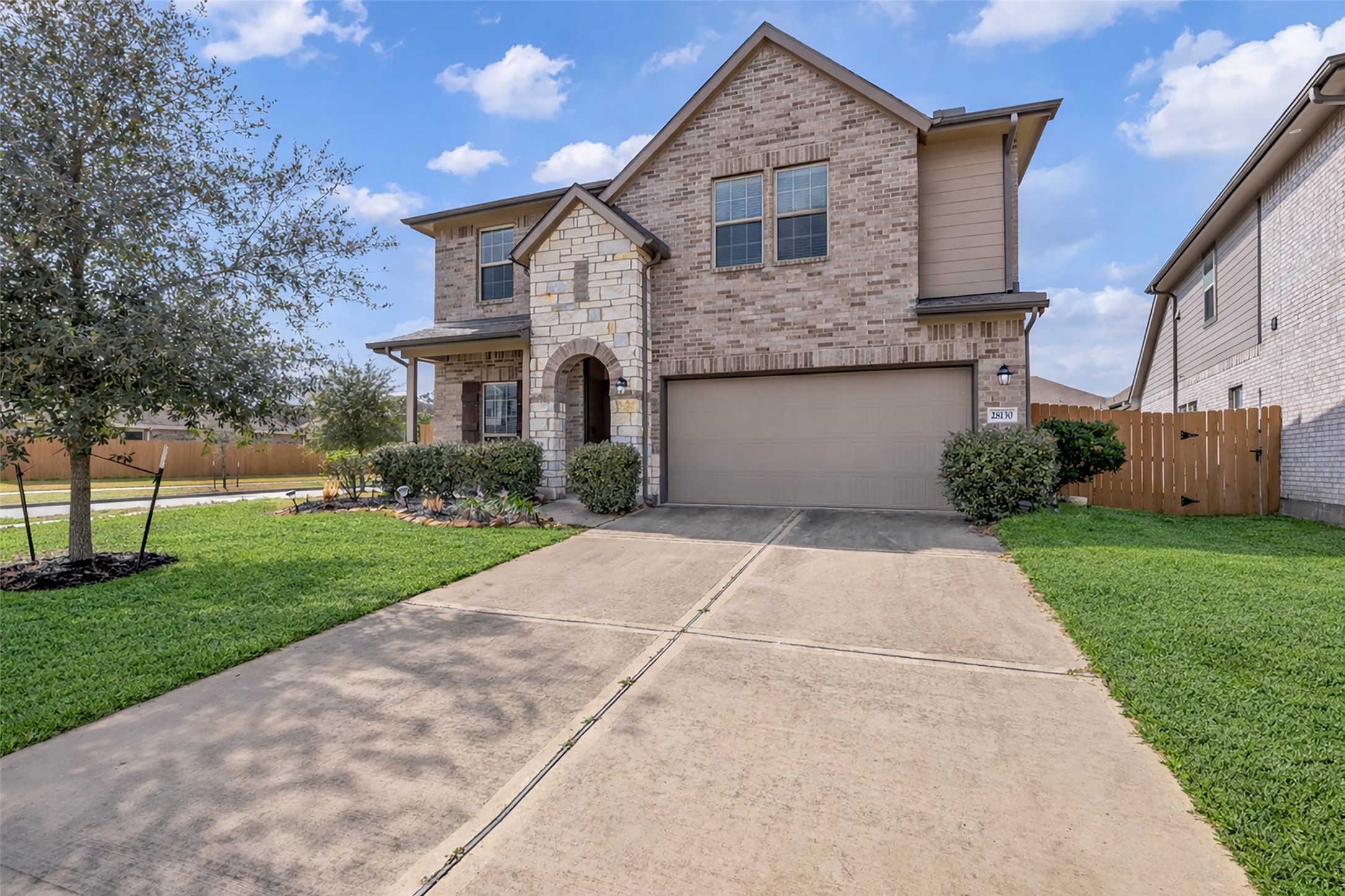 28130 Aspen Horizon Drive Spring, TX 77386 - Photo 1 of 39 a front view of a house with a yard