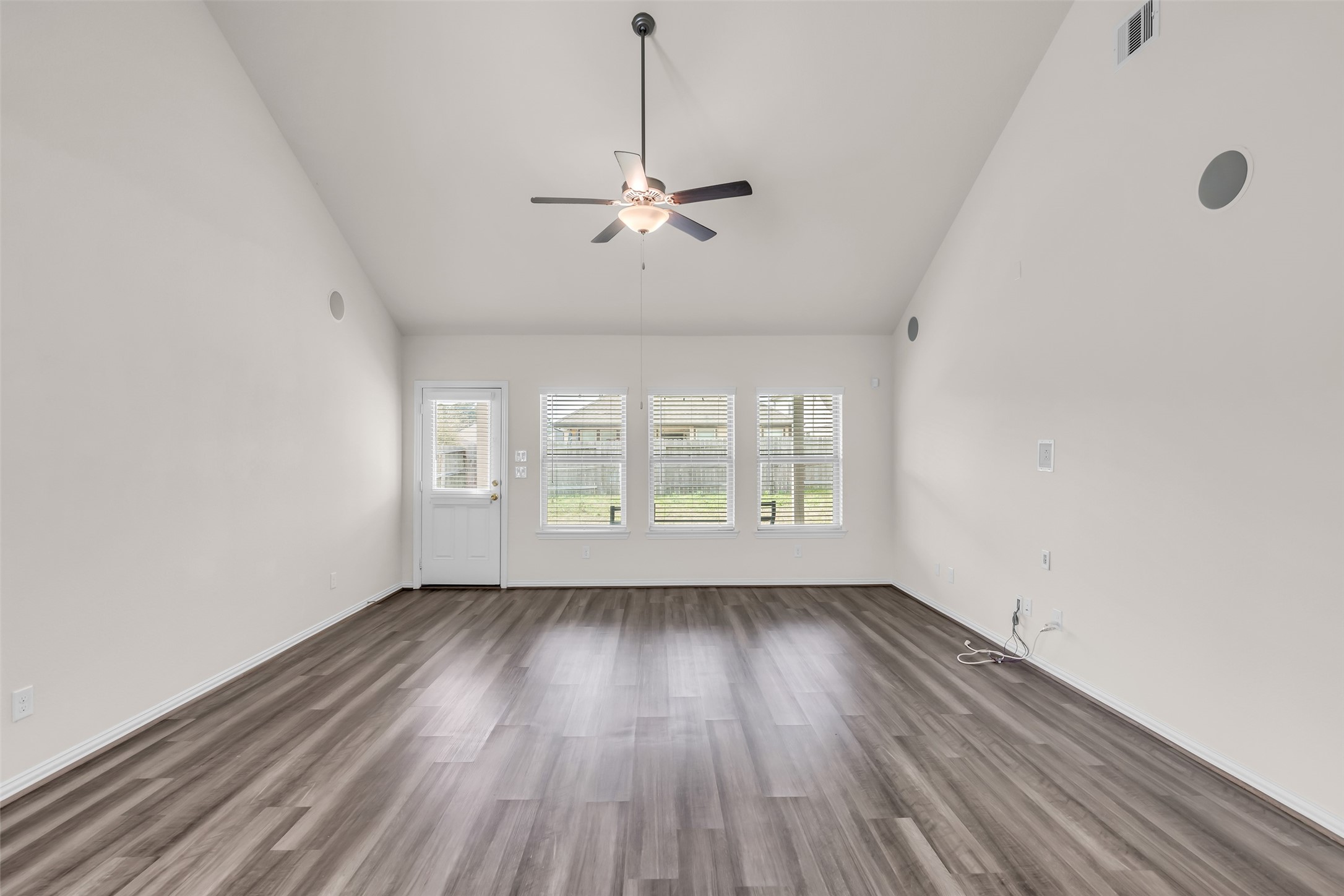 28130 Aspen Horizon Drive Spring, TX 77386 - Photo 16 of 39 wooden floor in an empty room with a window