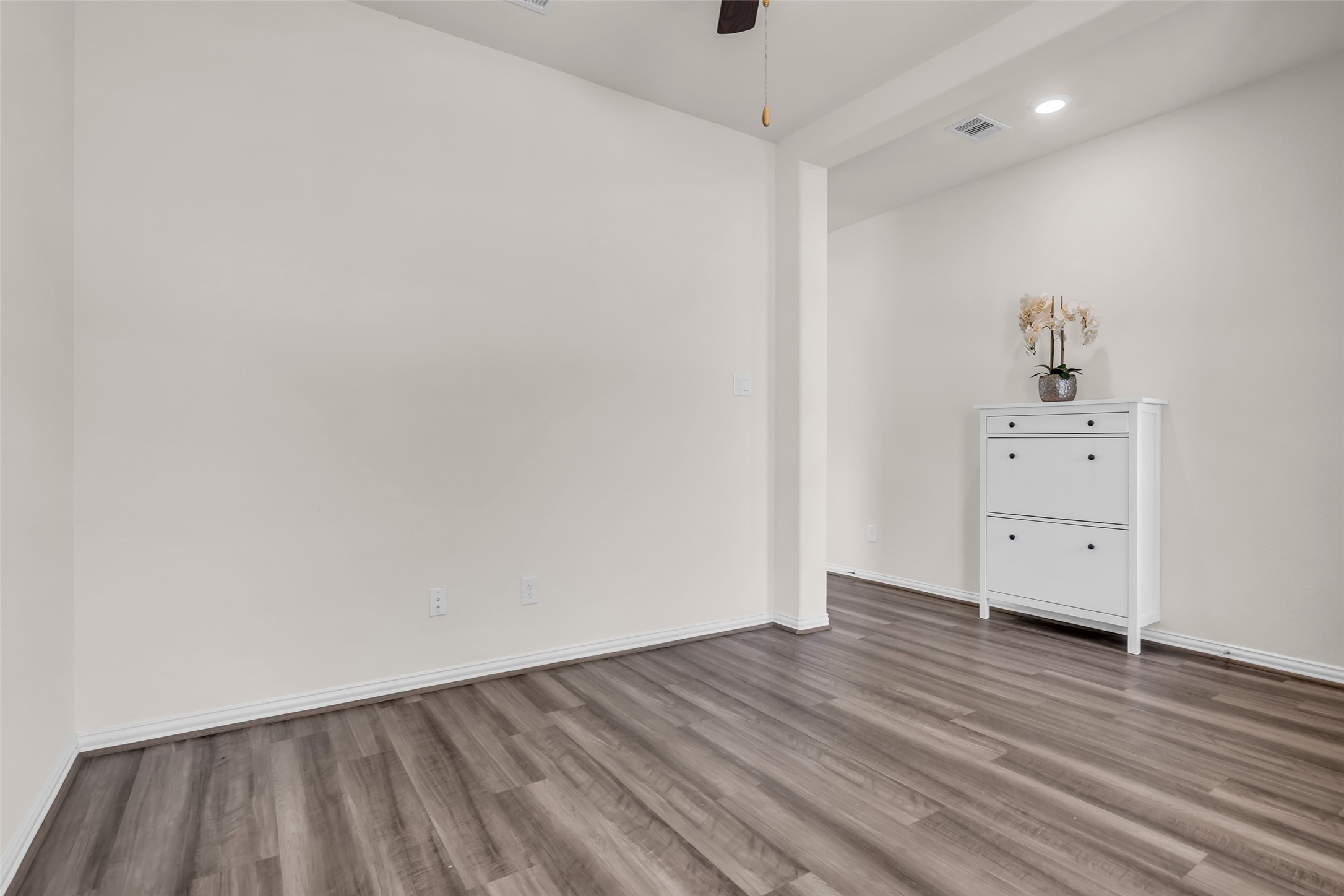 28130 Aspen Horizon Drive Spring, TX 77386 - Photo 2 of 39 a view of an empty room with wooden floor