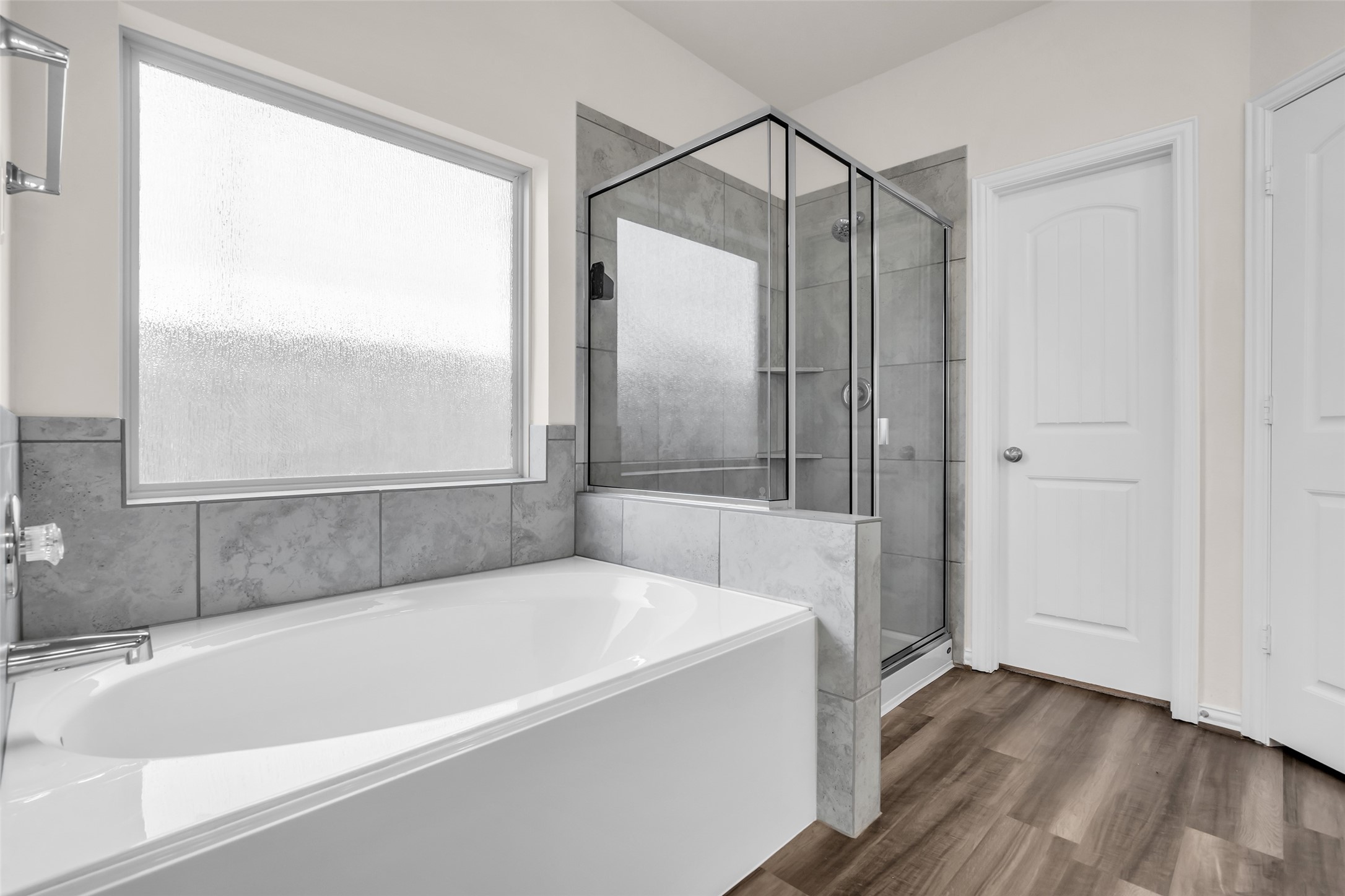 28130 Aspen Horizon Drive Spring, TX 77386 - Photo 22 of 39 a bathroom with a bathtub and a shower