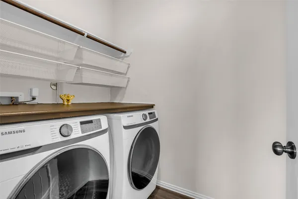 a utility room with dryer and washer