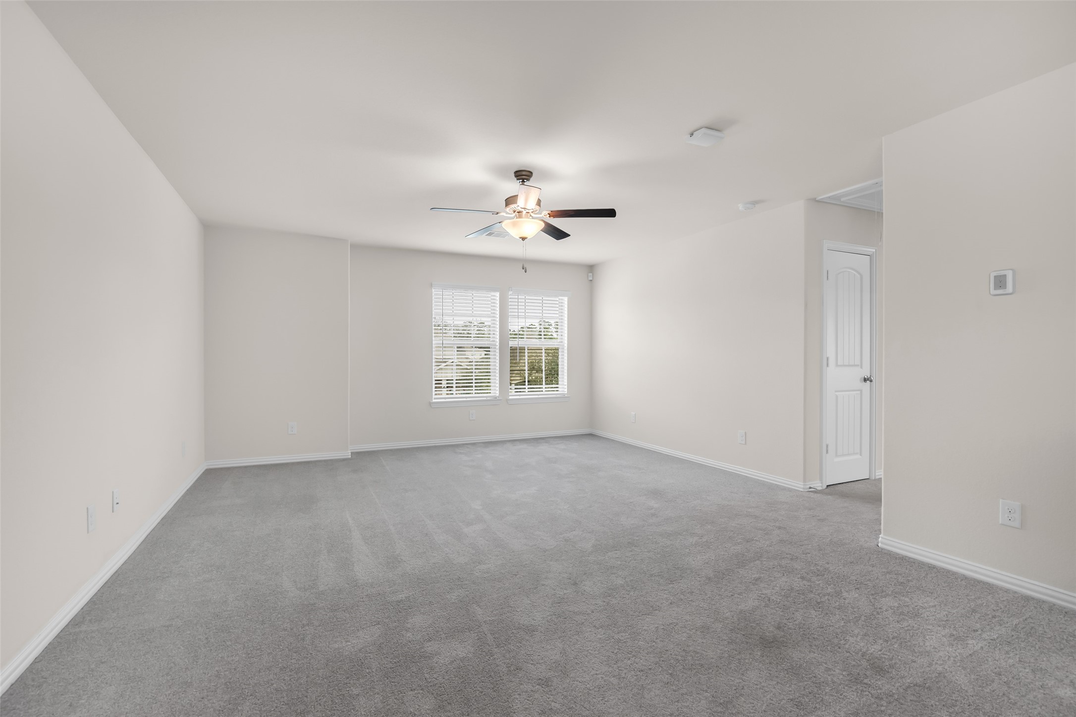 28130 Aspen Horizon Drive Spring, TX 77386 - Photo 26 of 39 an empty room with a window and a ceiling fan