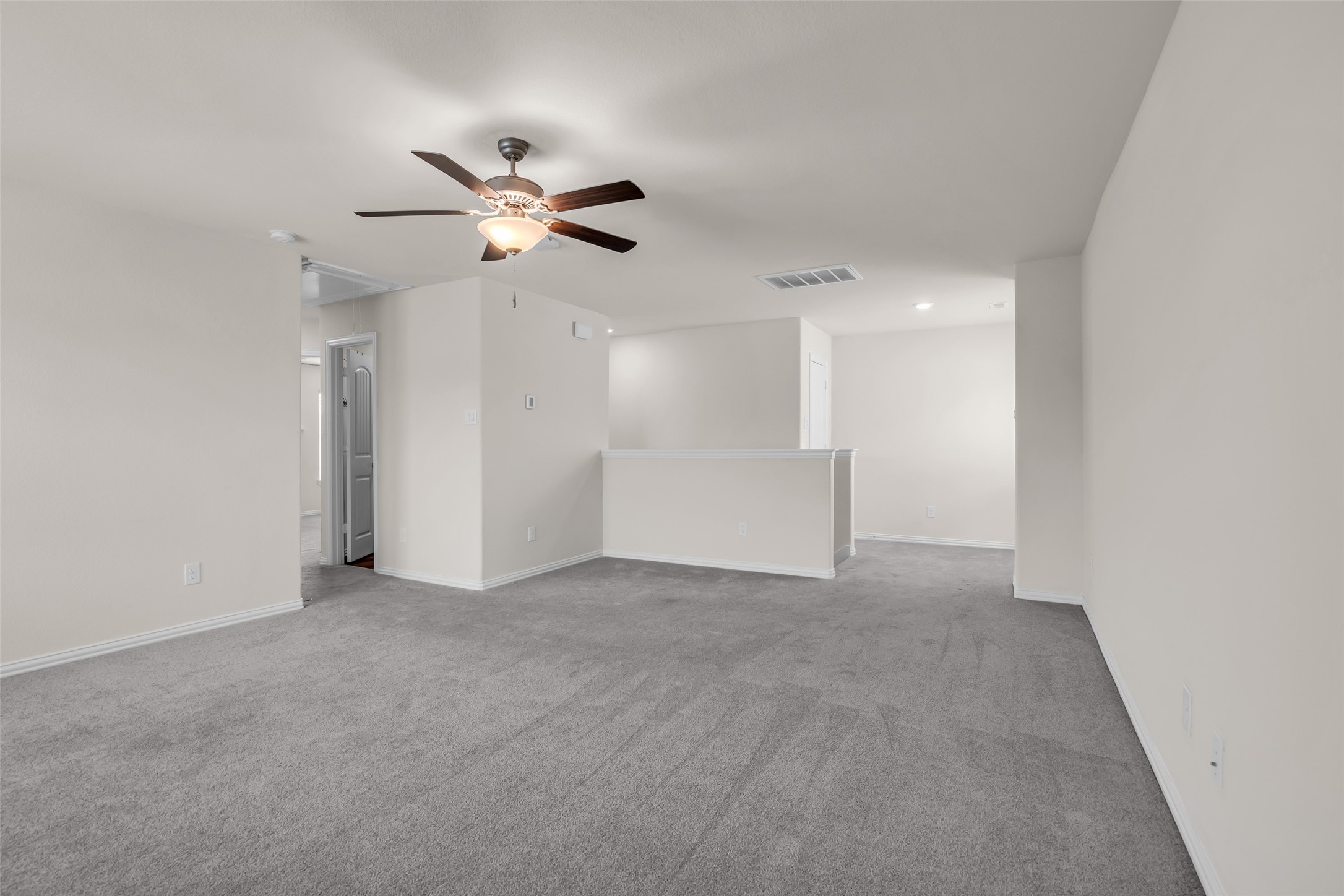 28130 Aspen Horizon Drive Spring, TX 77386 - Photo 27 of 39 an empty room with closet and a ceiling fan
