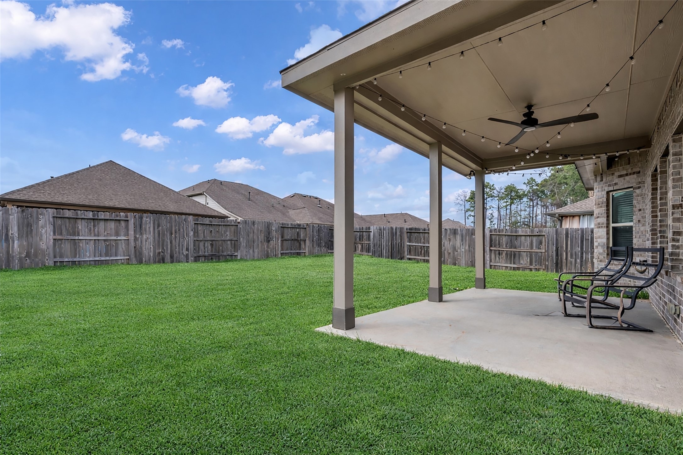 28130 Aspen Horizon Drive Spring, TX 77386 - Photo 38 of 39 a view of a chair and table in backyard of the house
