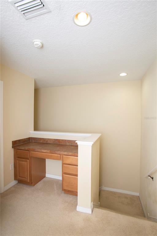 11919 Essington Street New Port Richey, FL 34654 - Photo 17 of 46 a view of an empty room