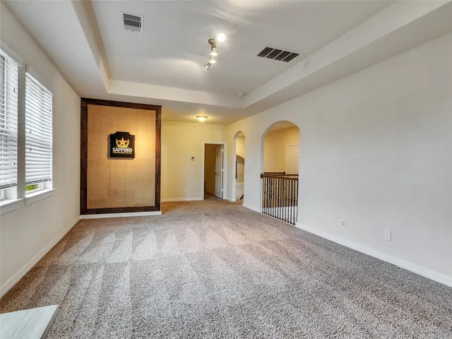 wooden floor and windows in an empty room