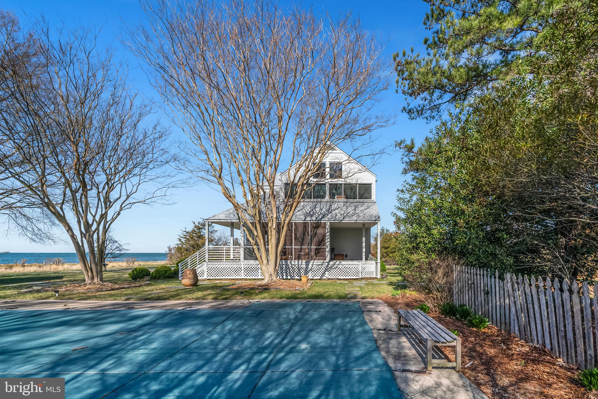 26319 Chanticleer Road Oxford, MD 21654 - Photo 16 of 55 a front view of a house with a yard