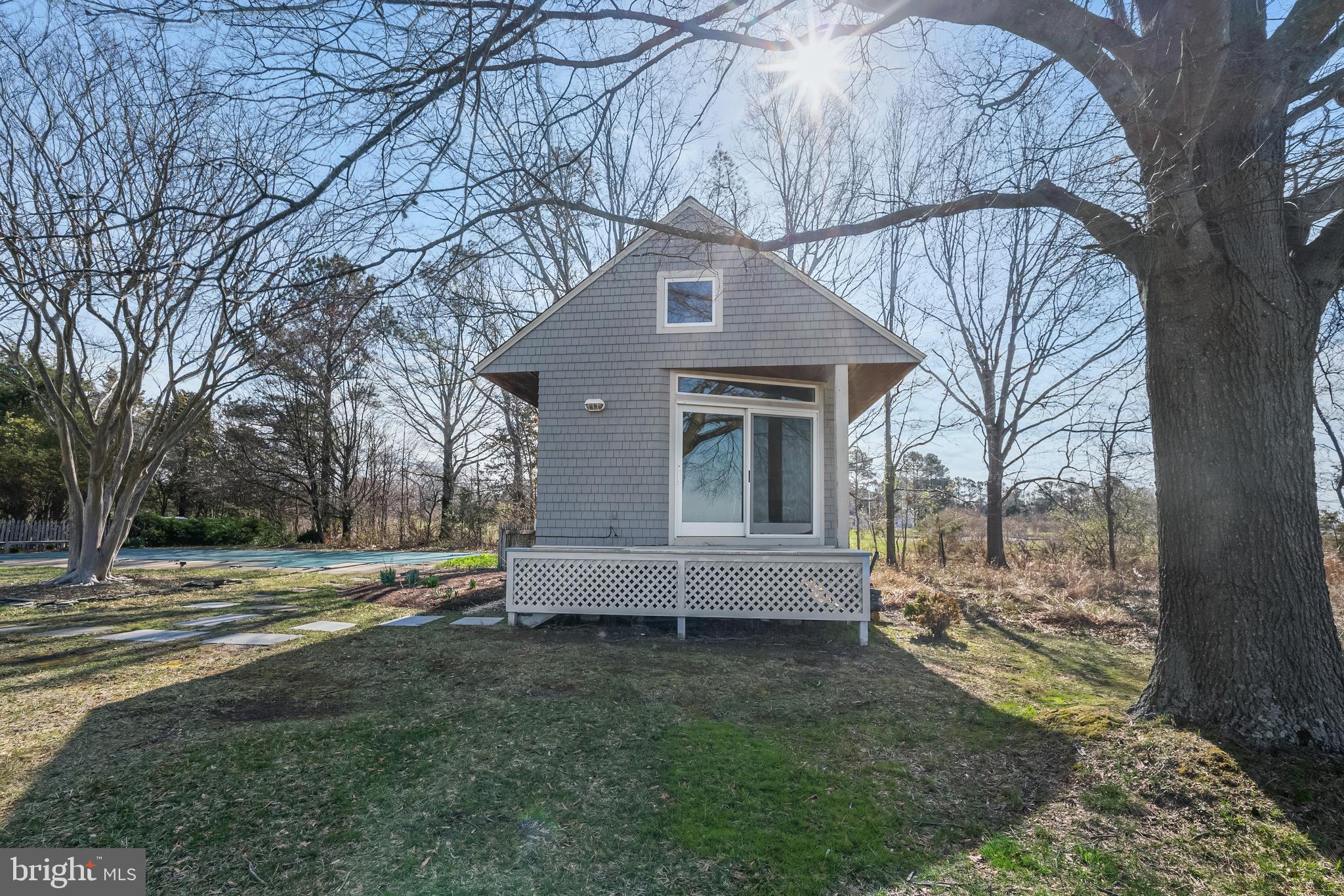 26319 Chanticleer Road Oxford, MD 21654 - Photo 17 of 55 a view of a house with a yard