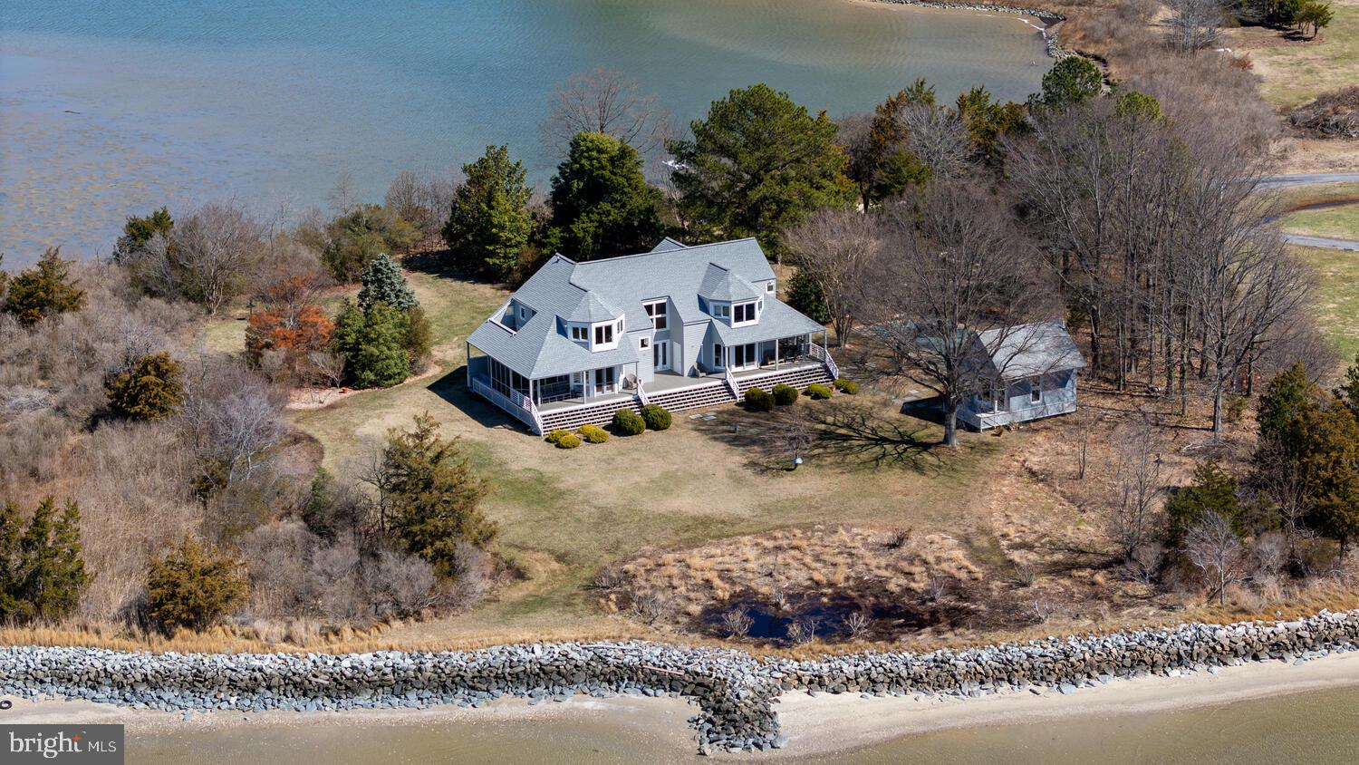 26319 Chanticleer Road Oxford, MD 21654 - Photo 2 of 55 an aerial view of a house with a yard basket ball court and outdoor seating