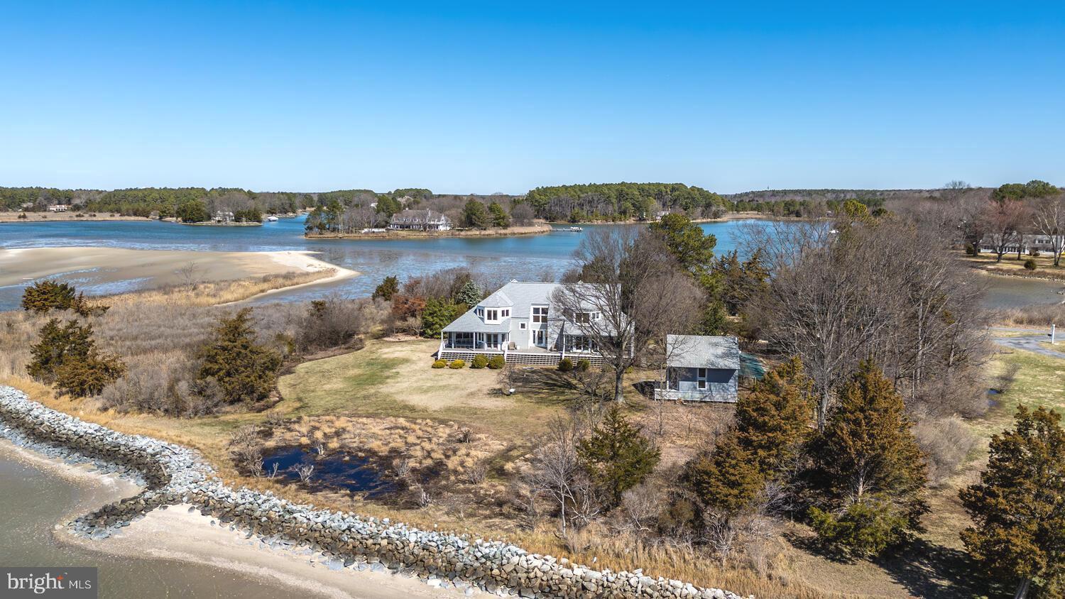 26319 Chanticleer Road Oxford, MD 21654 - Photo 4 of 55 a view of a lake with houses