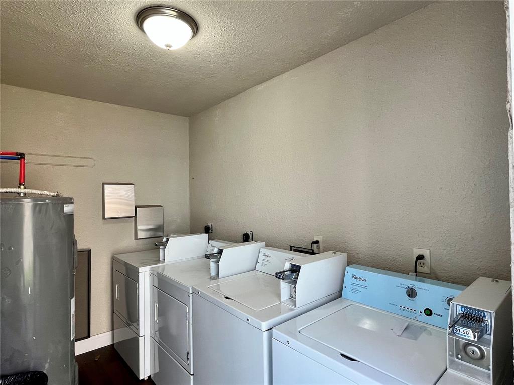 2526 West Prairie Street, Unit 204 Denton, TX 76201 - Photo 7 of 8 a utility room with dryer and washer
