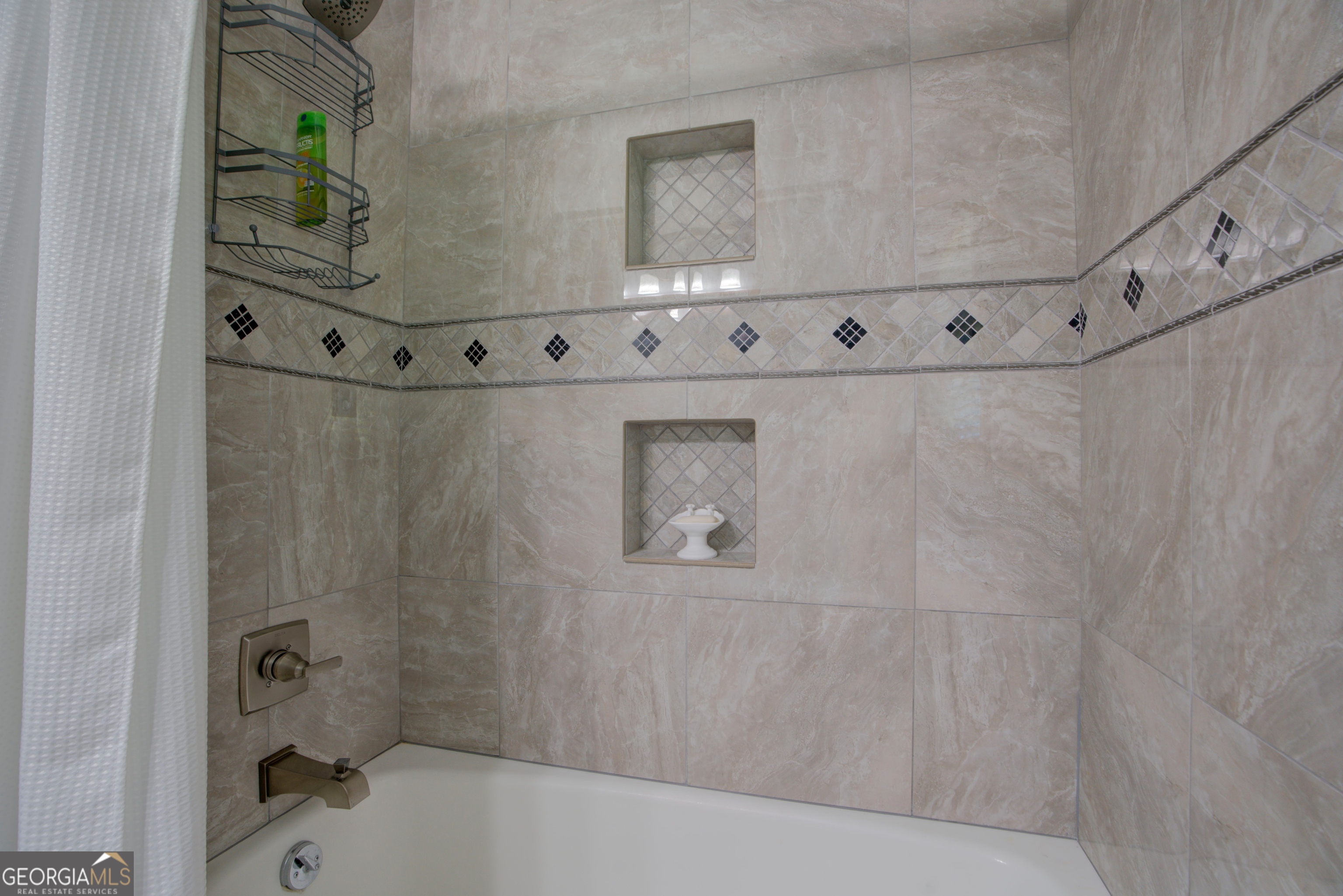 204 Green View Road Southwest Rome, GA 30165 - Photo 36 of 62 a bathroom with a bathtub and shower