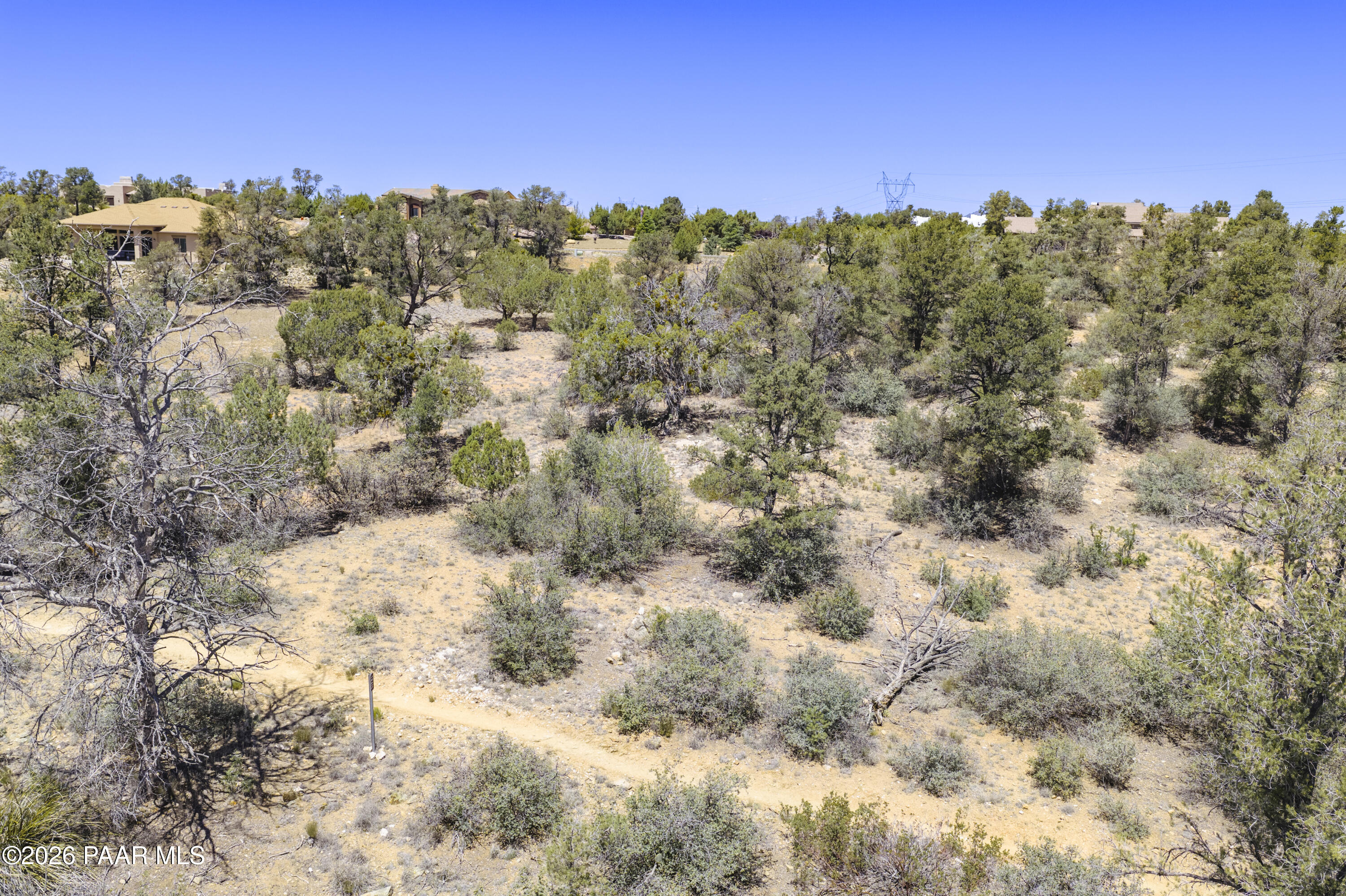 5825 West Almosta Ranch Road Prescott, AZ 86305 - Photo 13 of 19 a view of a yard with trees in the background