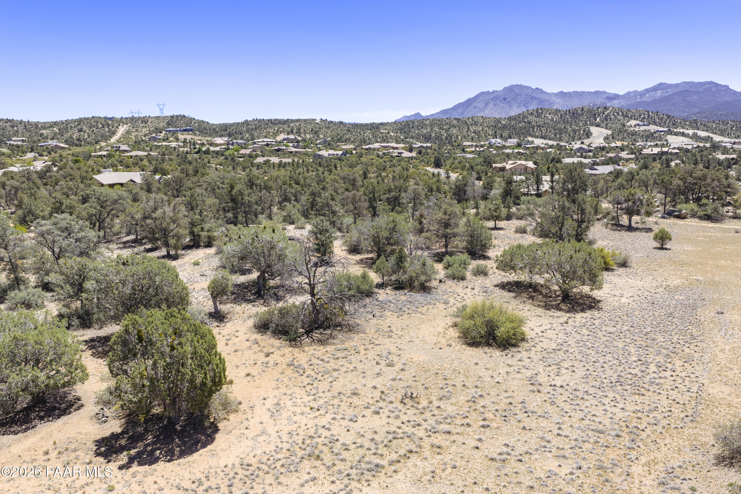 5825 West Almosta Ranch Road Prescott, AZ 86305 - Photo 14 of 19 a view of a dry yard with mountains in the background