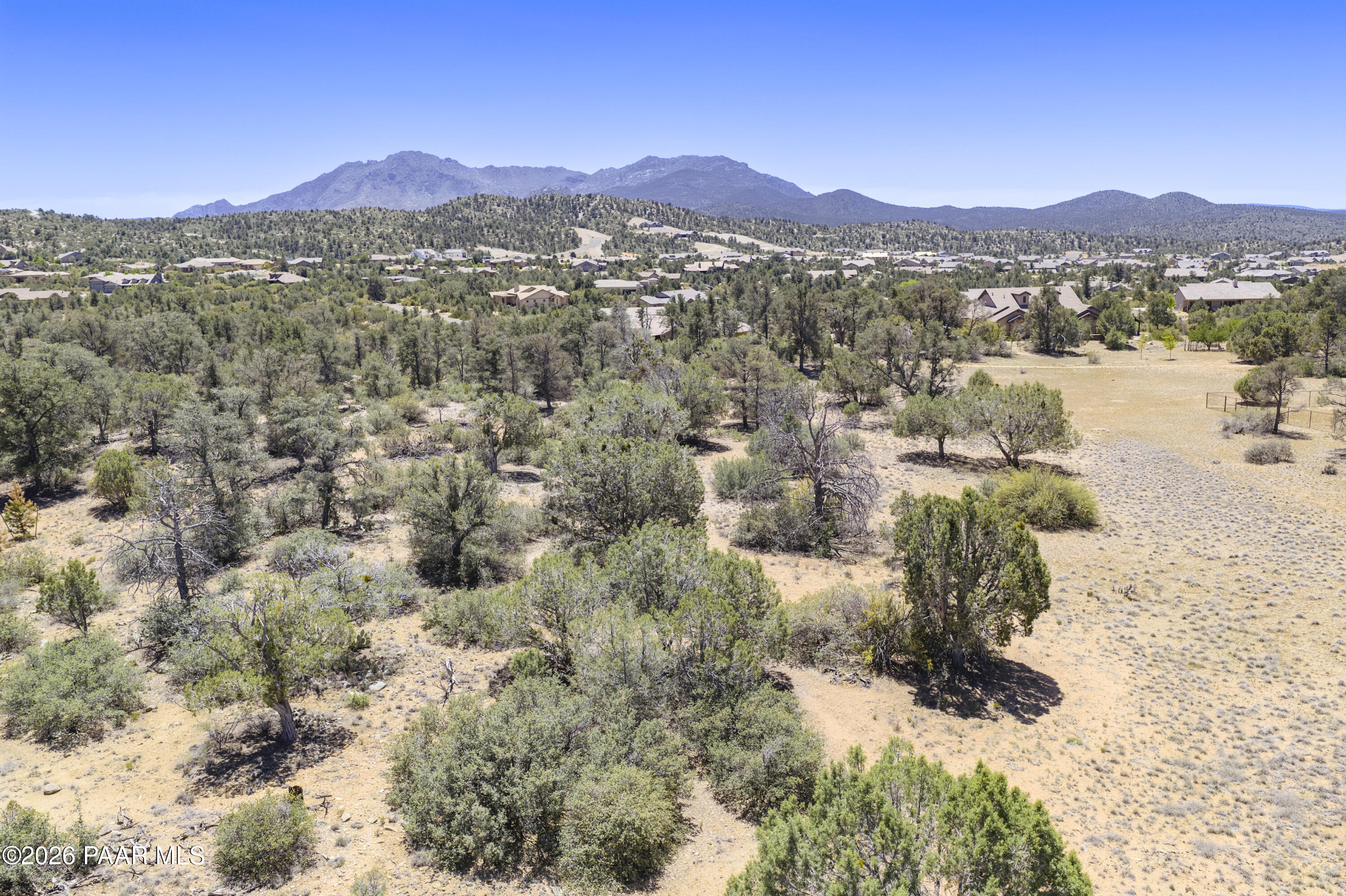5825 West Almosta Ranch Road Prescott, AZ 86305 - Photo 15 of 19 a view of a town with mountains in the background