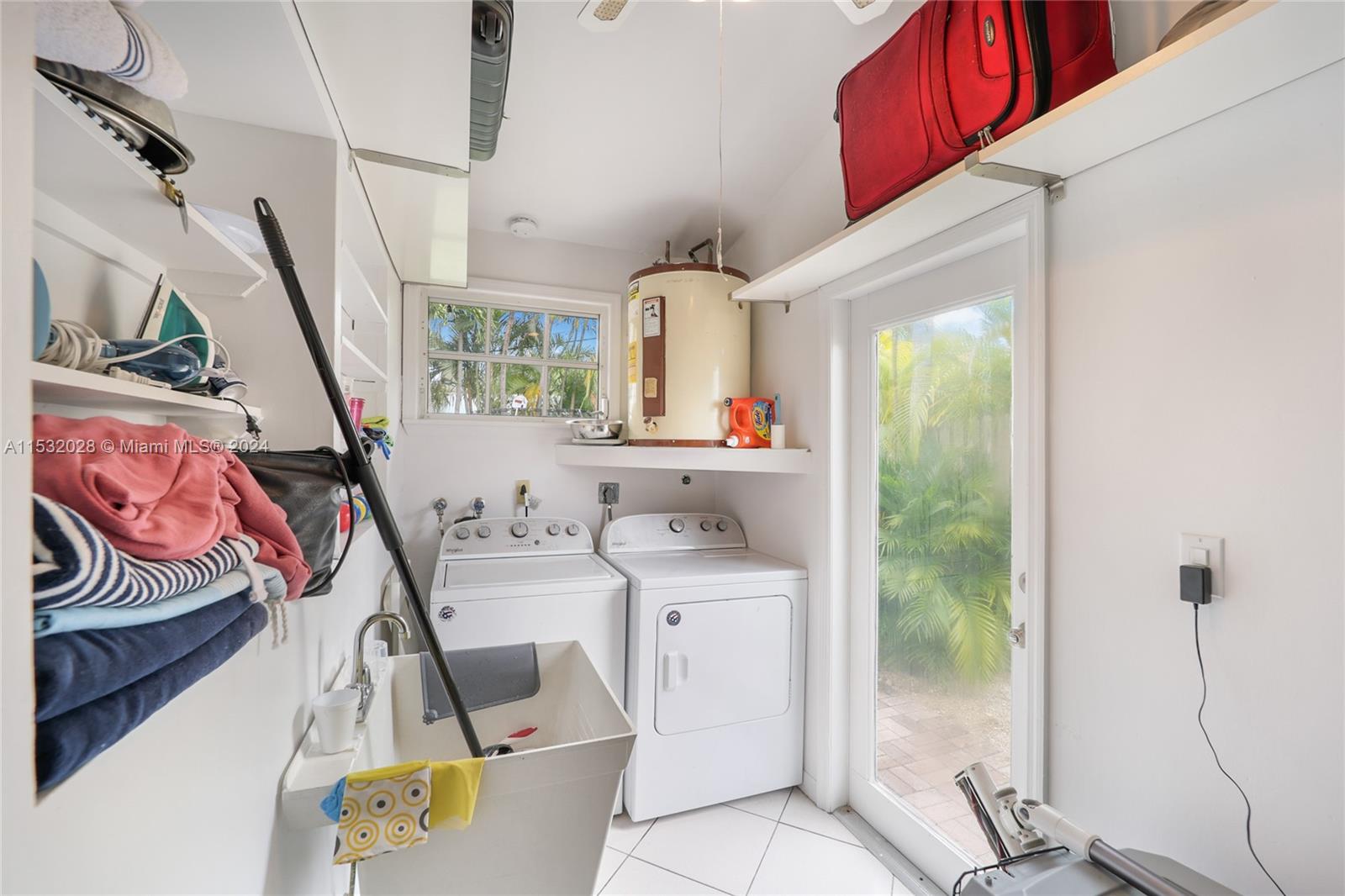 255 Ridgewood Road Key Biscayne, FL 33149 - Photo 17 of 18 a room with musical instruments