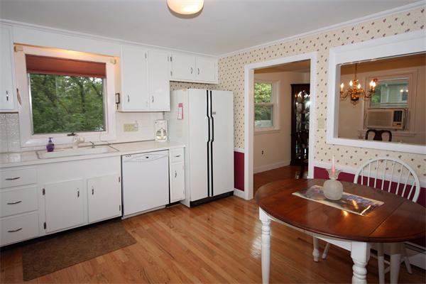 374 Ridge Street Arlington, MA 02474 - Photo 3 of 15 a kitchen with a sink appliances and cabinets