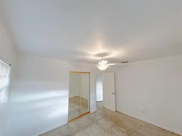 an empty room with a bathroom