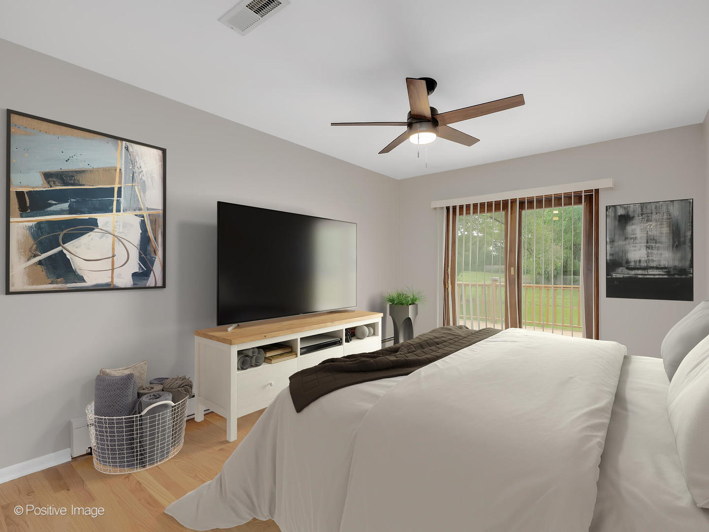 335 Oldfield Road Darien, IL 60561 - Photo 15 of 33 a bedroom with a bed and a flat screen tv