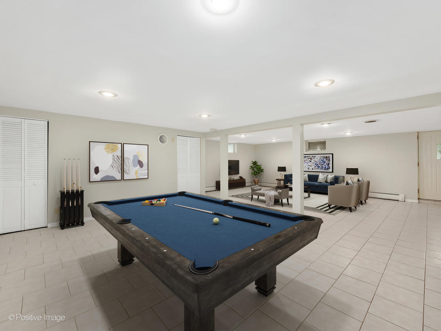335 Oldfield Road Darien, IL 60561 - Photo 20 of 33 a room with gym equipment and a table