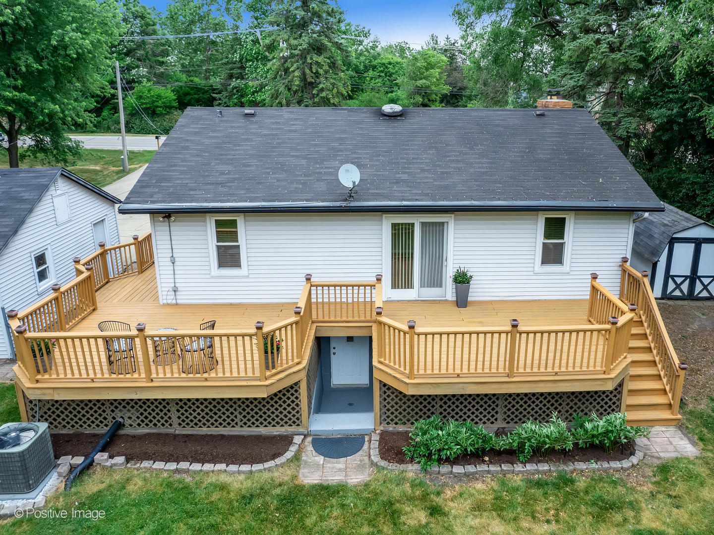 335 Oldfield Road Darien, IL 60561 - Photo 24 of 33 a view of house with garden and deck