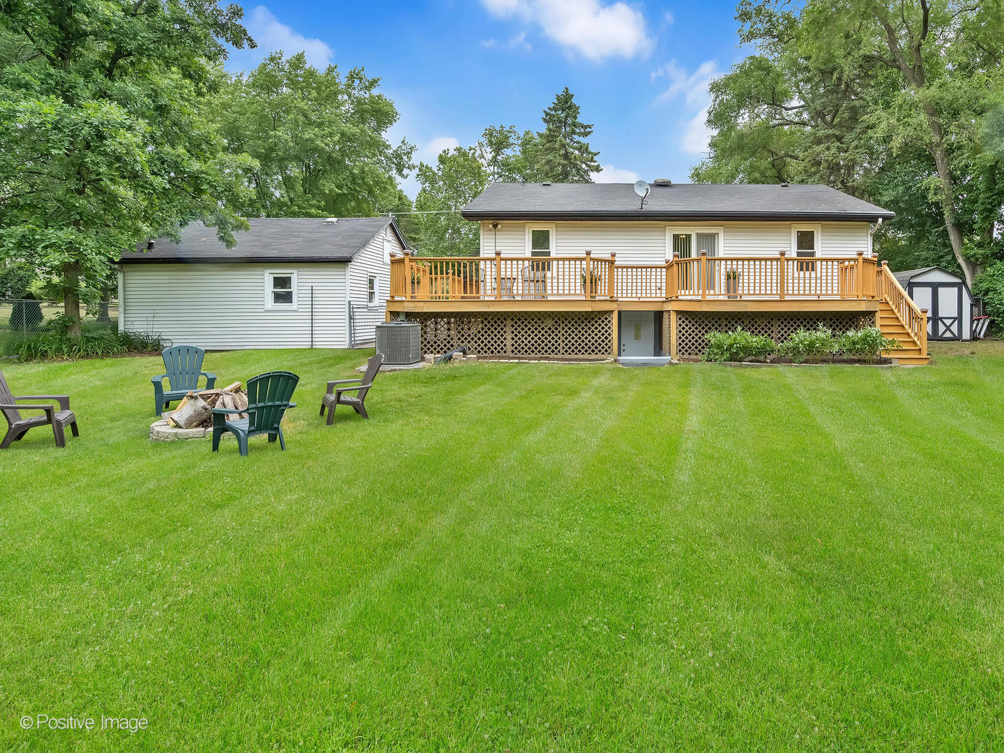 335 Oldfield Road Darien, IL 60561 - Photo 25 of 33 a view of a house with a yard and sitting area
