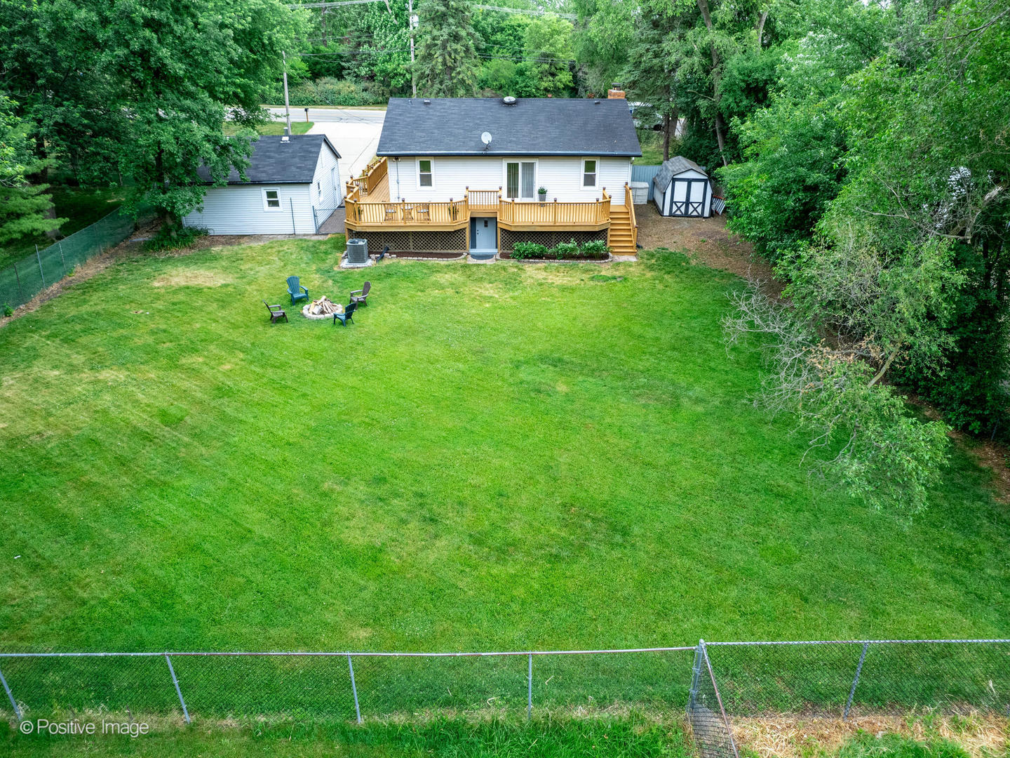335 Oldfield Road Darien, IL 60561 - Photo 27 of 33 a front view of a house with garden