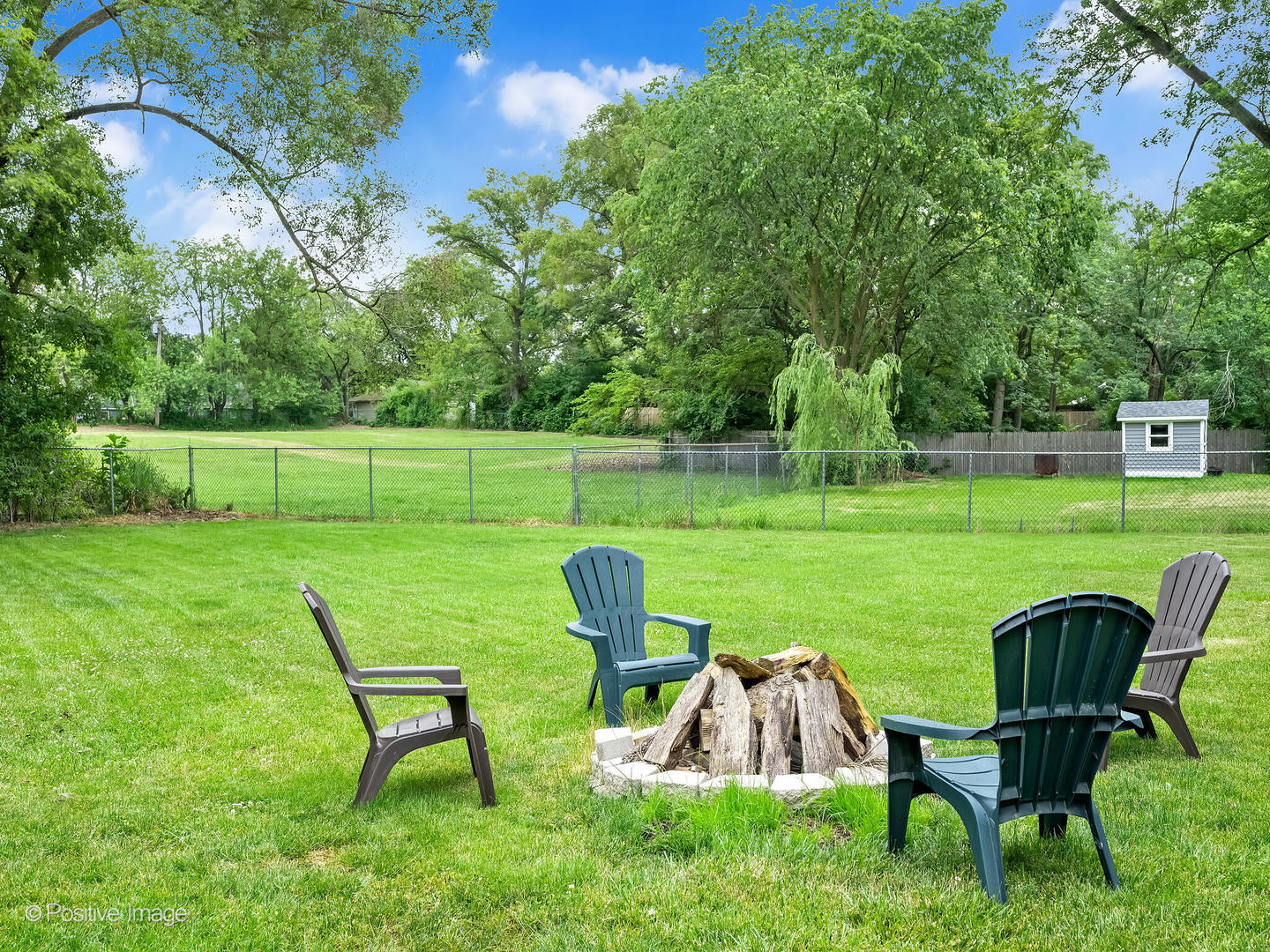335 Oldfield Road Darien, IL 60561 - Photo 30 of 33 a view of a table and chairs in the garden