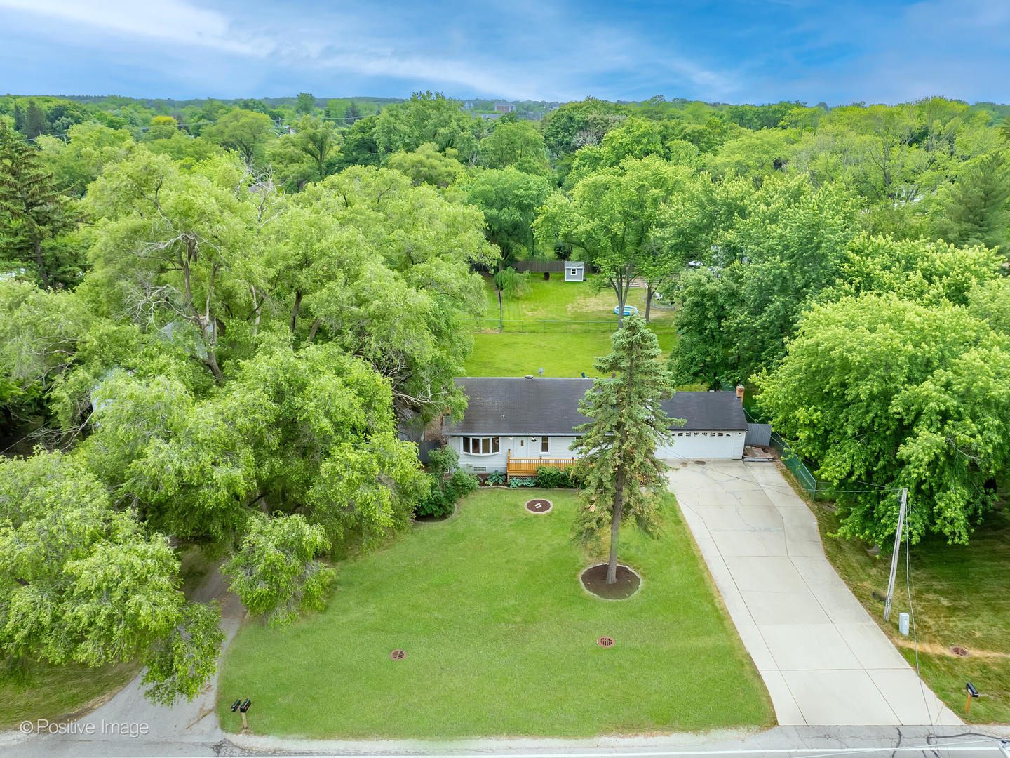 335 Oldfield Road Darien, IL 60561 - Photo 3 of 33 a view of yard with green space