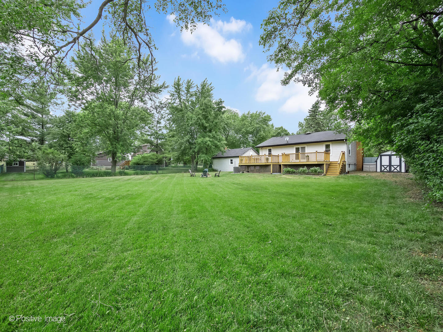 335 Oldfield Road Darien, IL 60561 - Photo 31 of 33 a house view with a garden space