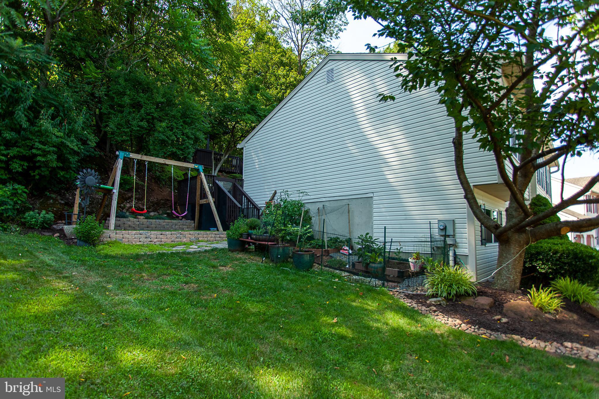 4346 Hillside Road Reading, PA 19606 - Photo 37 of 42 SIDE YARD - GARDEN