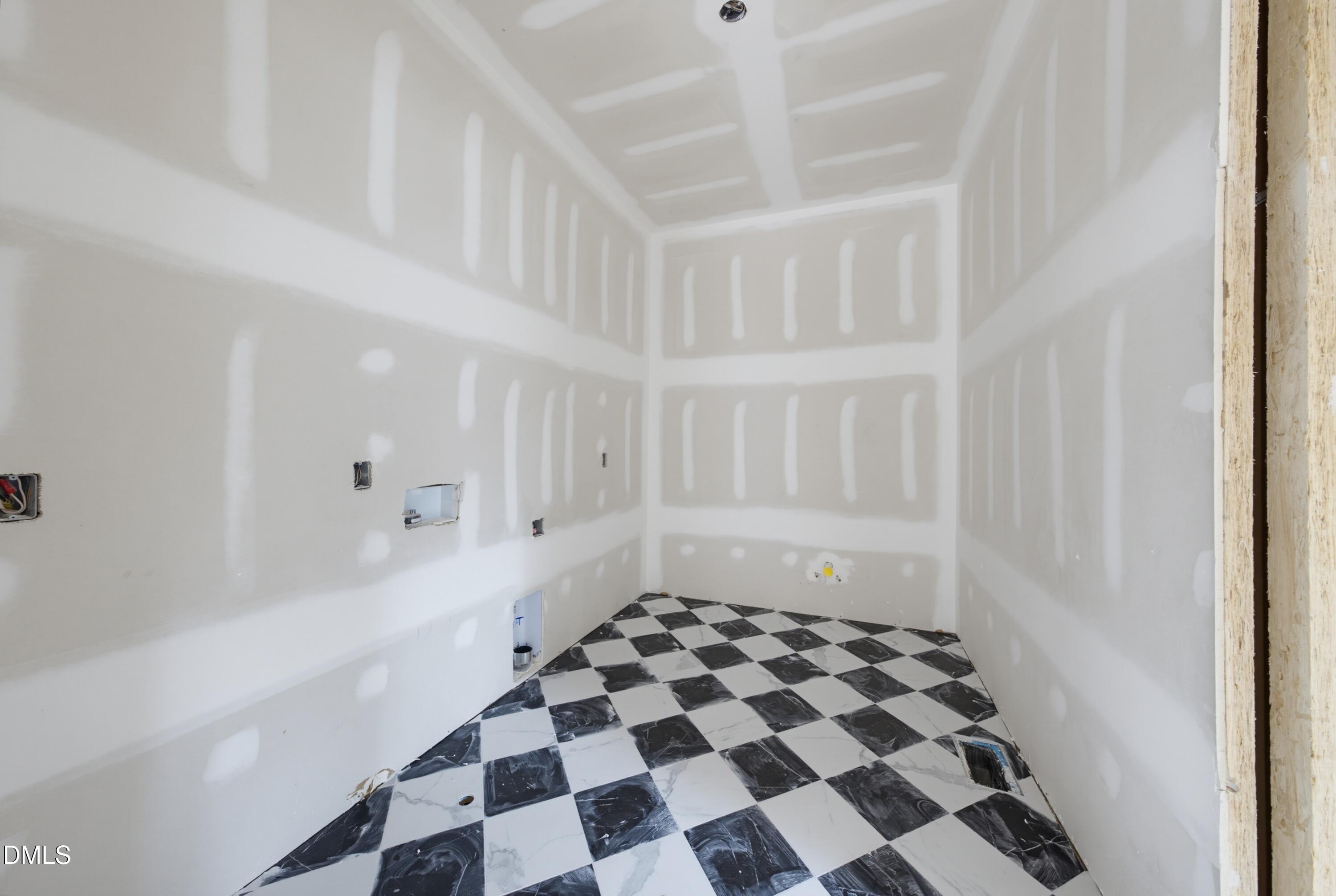 7508 Grist Mill Road Raleigh, NC 27615 - Photo 23 of 32 a bathroom with a bathtub and a shower