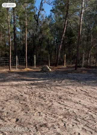 a view of a backyard of a house