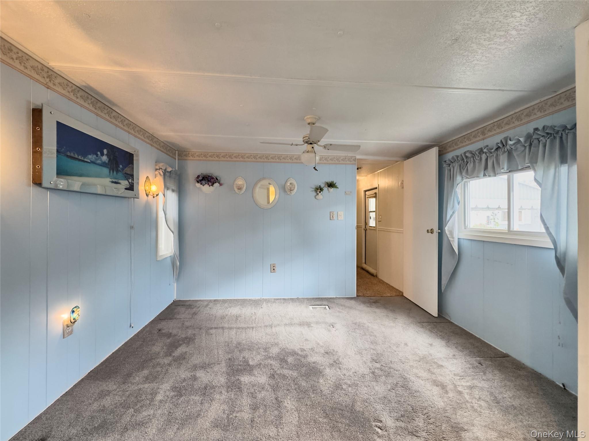 1964 River Road, Unit 55 Calverton, NY 11933 - Photo 9 of 13 a view of an empty room