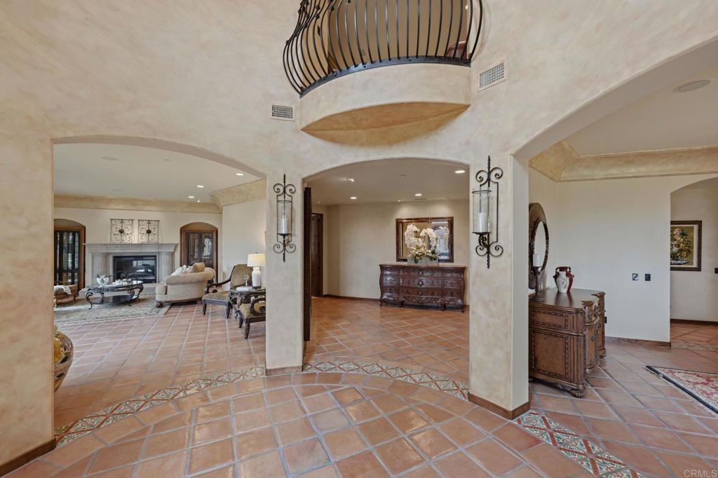 3244 Olivenhain Farms Road Encinitas, CA 92024 - Photo 6 of 47 a view of a living room and a livingroom with furniture